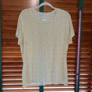 Gold and white patterned T-shirt.